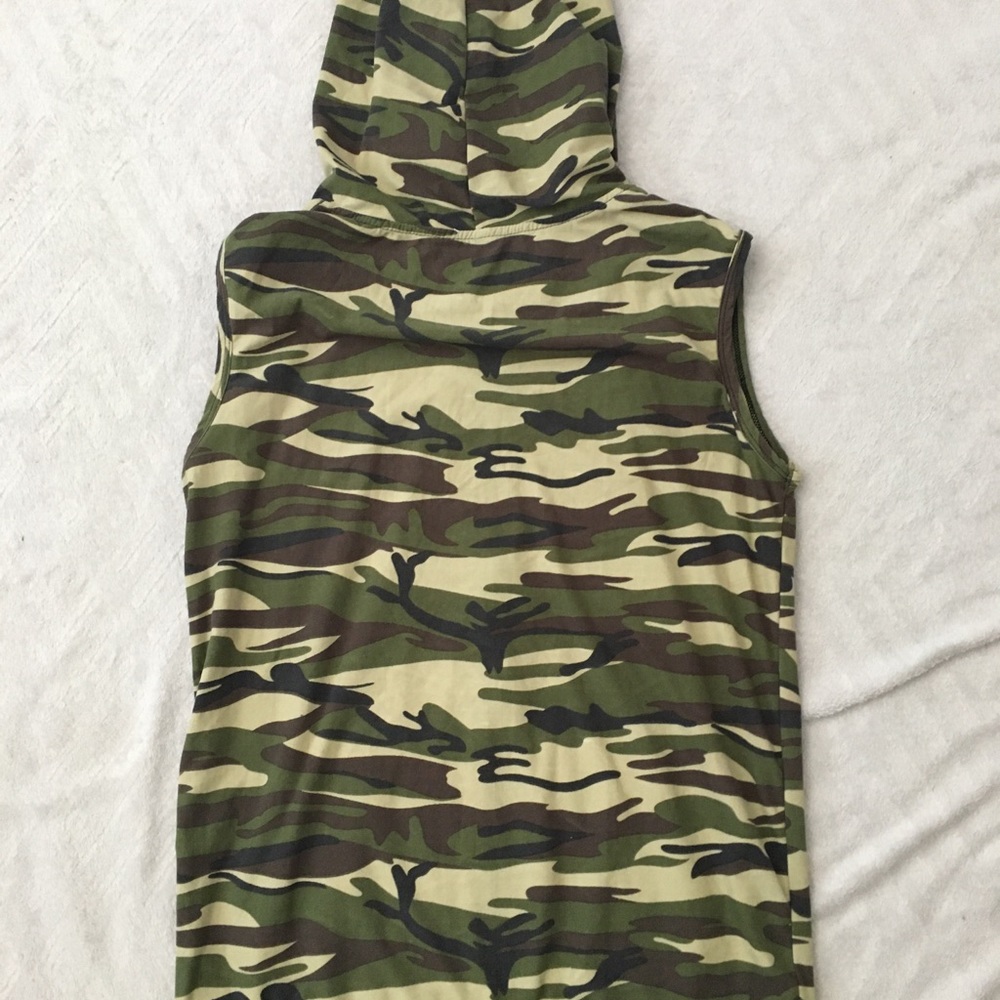 Green sleeveless zip up hoodie.